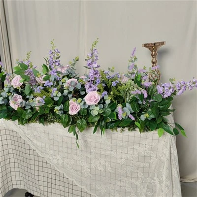 Lila blomsterarrangemang Bröllop